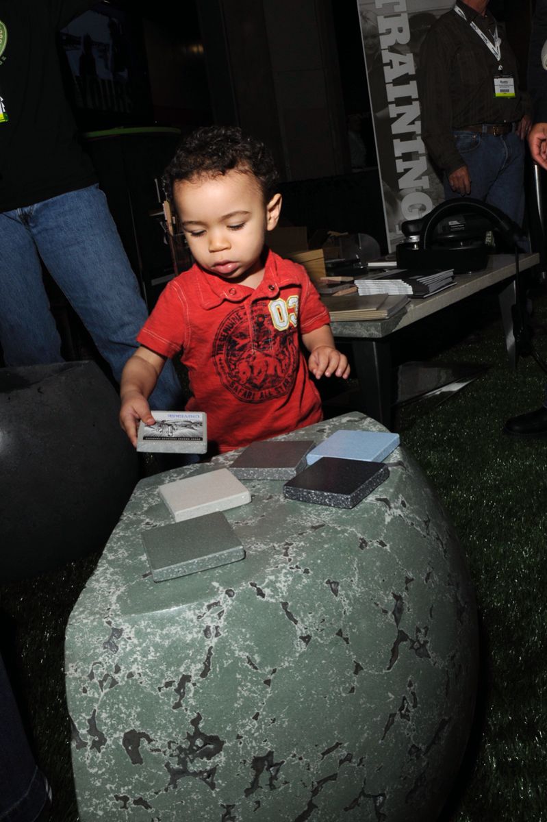 This is Brayden Hailey considering some samples at the 2011 Concrete Decor Show & Spring Training. His parents, Brandon and Carmen, came to Nashville from Southaven, Miss., where Brandon operates Concrete Alternatives.